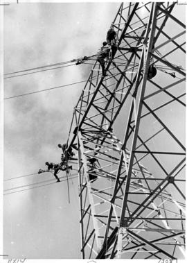 Hydro technicians working on tower at 104th Ave. and 140th St., Surrey