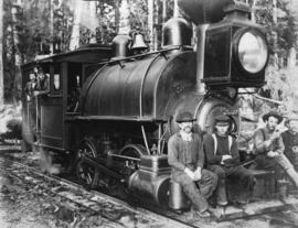 [Railroad engine, crew, and logs]