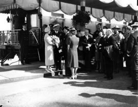 [King George VI and Queen Elizabeth prior to departure by train]