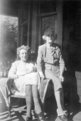 Marian Lindgren , nee Hines (right) with Florrie Wilson [left] on the porch of 3500 Willow Street...