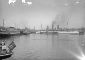 [Empress liner at C.P.R. dock - coaling hulk alongside]