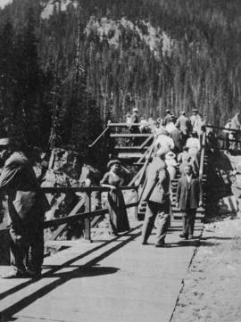 Aldyen Hendry leaning on a rail near mountain lookout