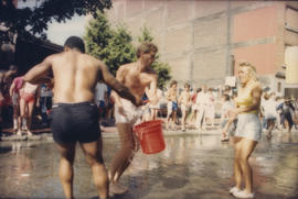 "Giant Fire Drill" participants pass bucket of water