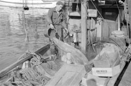 [Man on fishing boat]