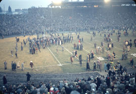 End of 43rd Grey Cup game at Empire Stadium, crowd at end zone