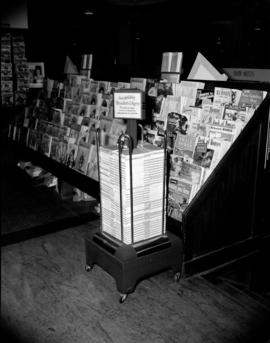 [Magazine rack and Reader's Digest display]