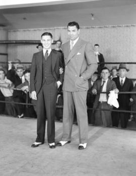 Jack Dempsey [and an unidentified man]