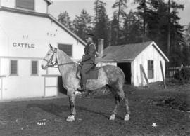 58th C.F.A. [man in uniform mounted on horseback - Exhibition grounds]