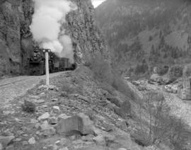 C.N.R. [Canadian National Railway] train [emerging from] tunnel [near] Hell's Gate