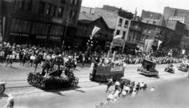 [The Birks, Columbia Theatre and Vancouver Trunk floats in the Dominion Day Parade]