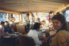 Group indoors on boat cruise