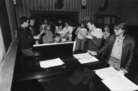 Group around piano at Griffiths Gibson Productions