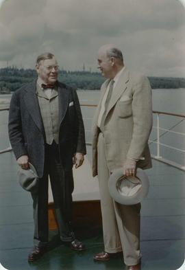 Eric W. Hamber and a friend aboard the Vencedor