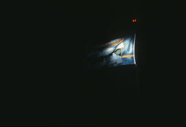 Centennial flag at night