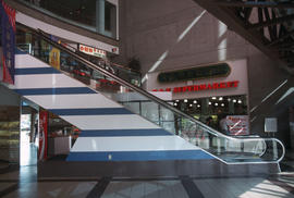 Escalator inside President Plaza shopping mall