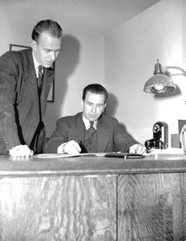 Hudson Bay Company - [Mr. Michel and Mr. Casher at desk]