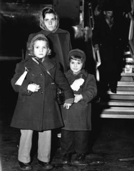 [Hungarian refugees arrive at the airport]