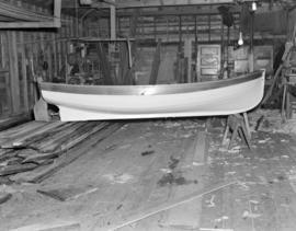 [Small boat under construction]