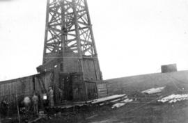 Oil country - [Men at oil well in Turner Valley, Alberta]