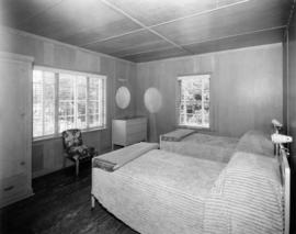 [Bungalow interior showing bedroom at Bowen Island Resort]
