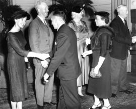 Sherwood Lett and Mrs. Evelyn Lett passing through a receiving line