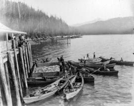 [Gillnet skiffs around a pot scow at the Rivers Inlet cannery]