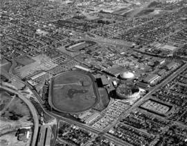 Aerial view of area surrounding Pacific Coliseum construction looking southeast