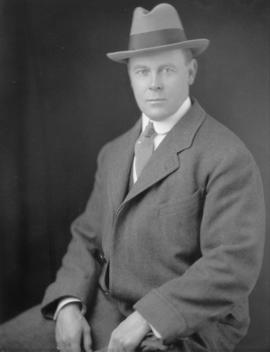 Eric W. Hamber in hat and coat