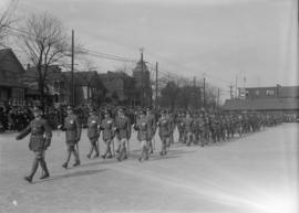 Military marching with rifles