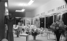 [Interior view of Mademoiselle Ltd. clothing store]