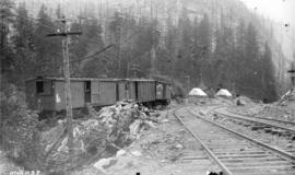 [C.P.R. work train boarding cars in Selkirk mountains]