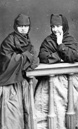 [Studio portrait of two women in] Lima Costume
