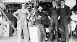 Four male workers