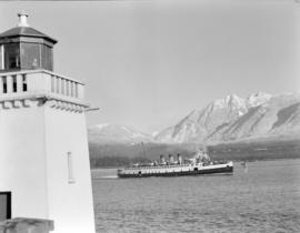 [The "Princess Elaine" passing by Brockton Point lighthouse]