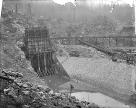 [Partially constructed Coquitlam Dam, showing upstream side of sluice tower]