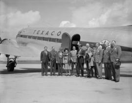 McColl Frontenac Oil Co. : arrival of officials at airport [Texaco airplane]