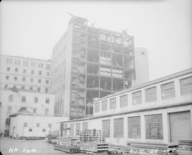 Construction of pan house: exterior view from southwest