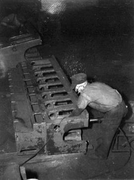 [Man at work at Vancouver Engineering Works]