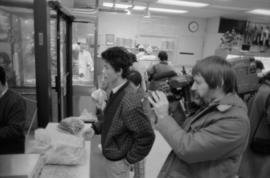 Crew taping inside a  shop in Chinatown for the Saltwater City video