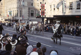 48th Grey Cup Parade, on Georgia and Howe, men and women on horseback