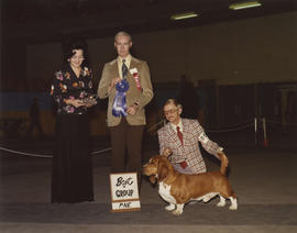 Best in Group [Hound Group: Bassett Hound] award being presented at 1976 P.N.E. All-Breed Dog Show