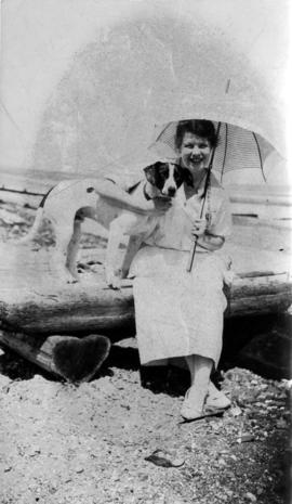 Eva Godfrey with Roy Pearson's dog (Keno) at Boundary Bay