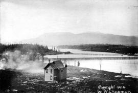 House with Granville Street Bridge and old C.P.R. Bridge in background