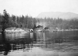 [View from the water of "The Pilotage" and boathouse near Skunk Cove]