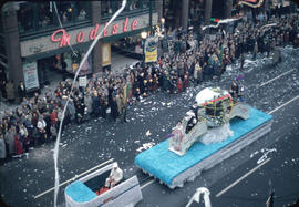 43rd Grey Cup Parade, on Granville Street, Canadian Pacific Airlines float , ticker tape, and spe...