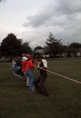 [Olympic Day at Carnarvon Park with children and adults playing tug of war]