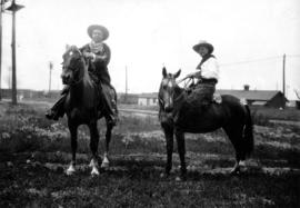 [Mayor L.D. Taylor on horseback with former Edmonton mayor Kenneth Blatchford]