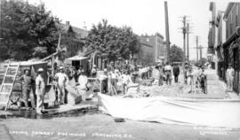 G.W. Ledingham, Contractor Laying Cement Sidewalks [in the 500 and 600 Blocks of Georgia Street]