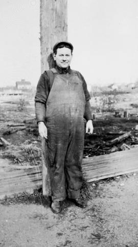 Man in coveralls