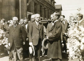 [Pastor Kwan and other men standing in front of church after Yip Sang funeral service]